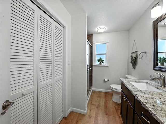 1232 Fairlee St, Lakeland, FL 33813 - full bath with a closet, vanity, a stall shower, and healthy amount of natural light