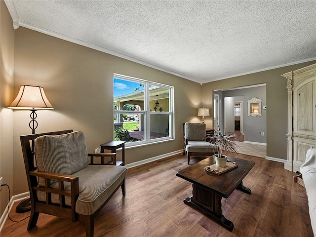1232 Fairlee St, Lakeland, FL 33813 - living area featuring crown molding, wood finished floors, and a textured ceiling