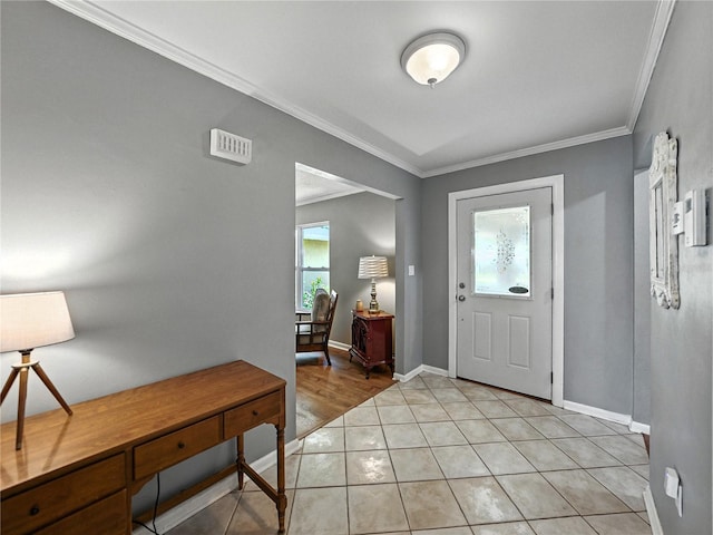 1232 Fairlee St, Lakeland, FL 33813 - foyer entrance with crown molding and light tile patterned flooring