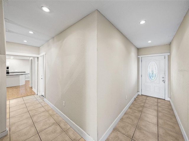 4230 Viola Rd, Lakeland, FL 33810 - hall with light tile patterned floors and recessed lighting