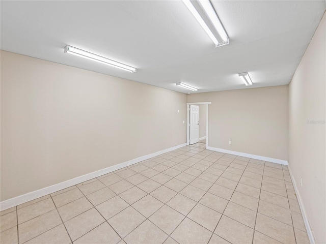 4230 Viola Rd, Lakeland, FL 33810 - unfurnished room featuring baseboards and light tile patterned floors