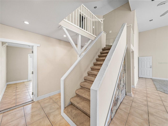 4230 Viola Rd, Lakeland, FL 33810 - stairway with tile patterned flooring and recessed lighting