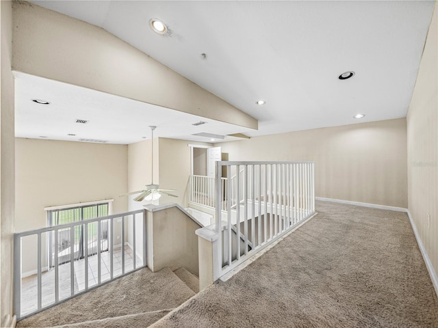 4230 Viola Rd, Lakeland, FL 33810 - hall with carpet, an upstairs landing, high vaulted ceiling, and recessed lighting