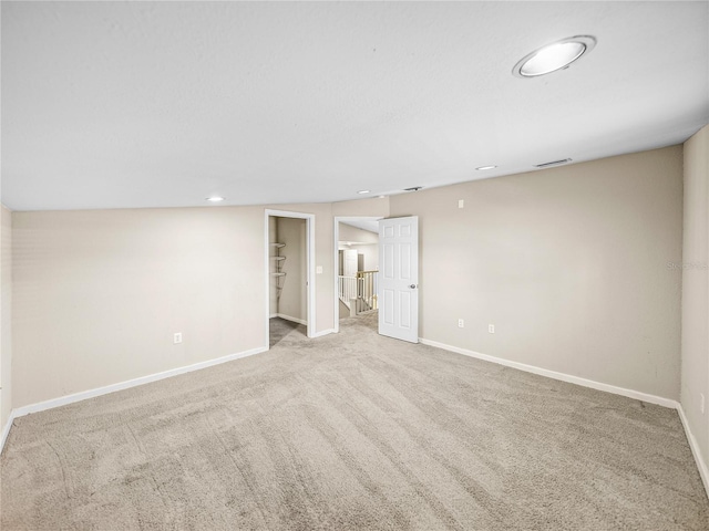 4230 Viola Rd, Lakeland, FL 33810 - carpeted empty room with baseboards and recessed lighting