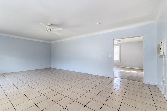 121 F Ave SW, Winter Haven, FL 33880 - empty room with ceiling fan and light tile patterned floors
