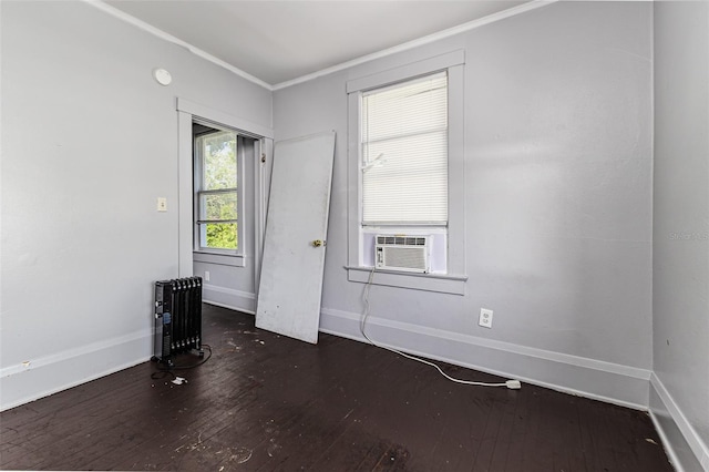 121 F Ave SW, Winter Haven, FL 33880 - empty room featuring wood-type flooring, crown molding, and cooling unit