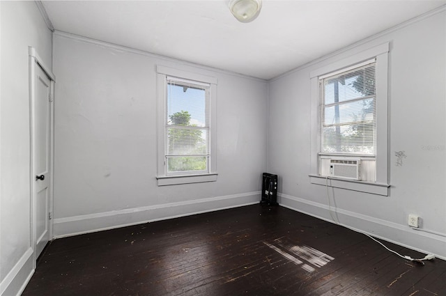121 F Ave SW, Winter Haven, FL 33880 - spare room with cooling unit, ornamental molding, healthy amount of natural light, and hardwood / wood-style flooring