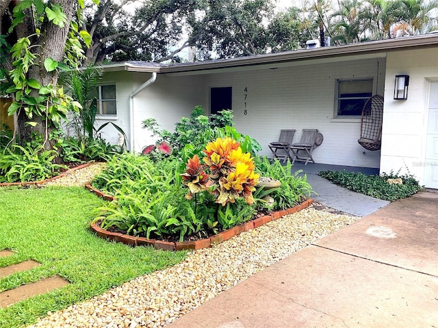 4718 Crystal Ave, Sarasota, FL 34231 - view of property exterior with a lawn