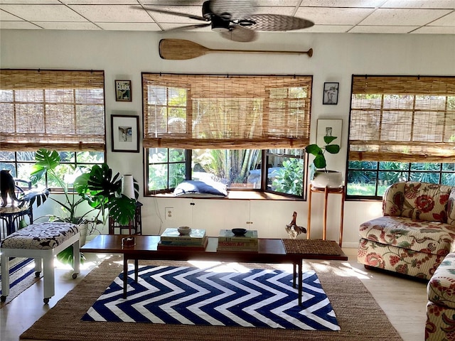 4718 Crystal Ave, Sarasota, FL 34231 - living room with a paneled ceiling, a ceiling fan, and healthy amount of natural light
