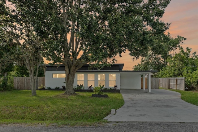 275 Garden Rd, Venice, FL 34293 - view of front of house with driveway and an attached carport