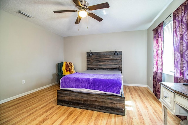 3542 Raintree Ct, Lakeland, FL 33803 - bedroom with light wood-style flooring and ceiling fan