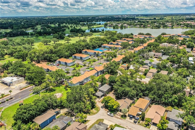 3542 Raintree Ct, Lakeland, FL 33803 - aerial perspective of suburban area with a nearby body of water and a tree filled landscape