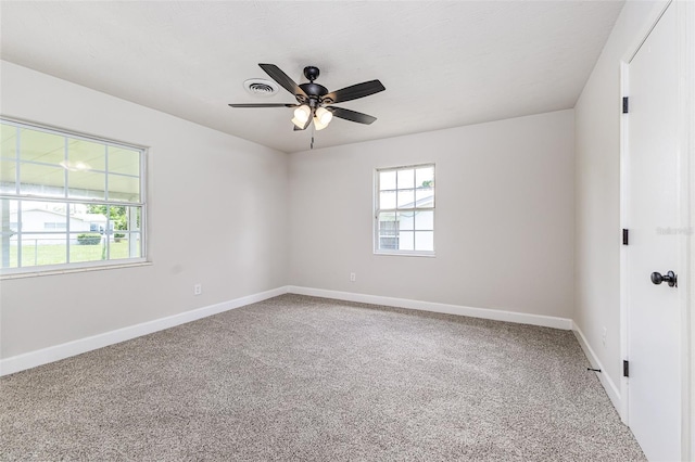 508 Boger Blvd N, Lakeland, FL 33803 - spare room with carpet flooring and ceiling fan