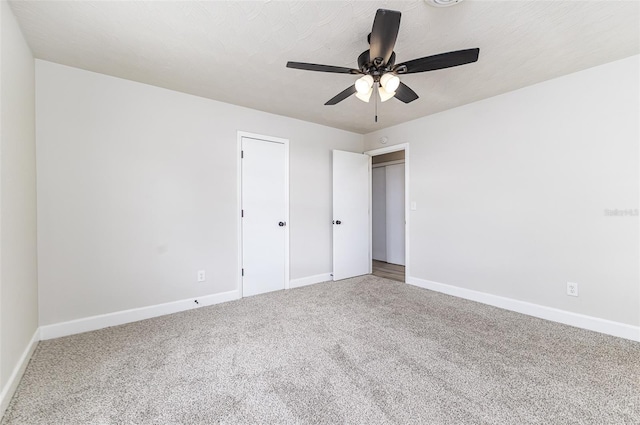508 Boger Blvd N, Lakeland, FL 33803 - unfurnished bedroom featuring carpet and a ceiling fan