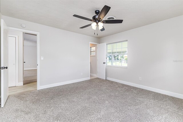 508 Boger Blvd N, Lakeland, FL 33803 - empty room featuring light colored carpet and a ceiling fan