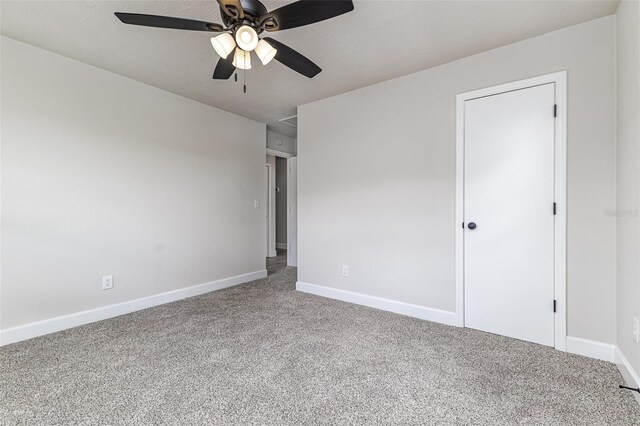 508 Boger Blvd N, Lakeland, FL 33803 - unfurnished room featuring ceiling fan and carpet flooring