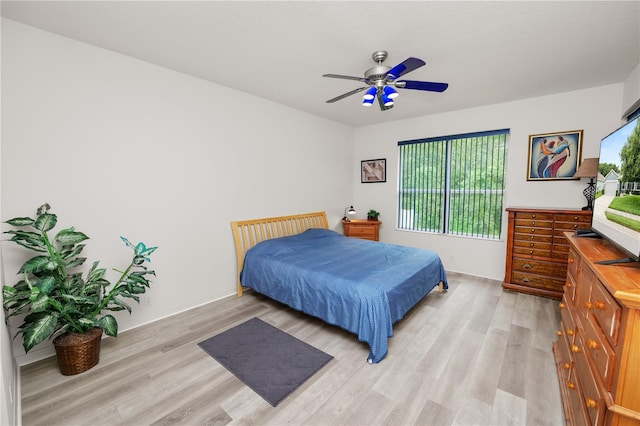 4242 Whistlewood Cir, Lakeland, FL 33811 - bedroom featuring light wood-style floors and ceiling fan