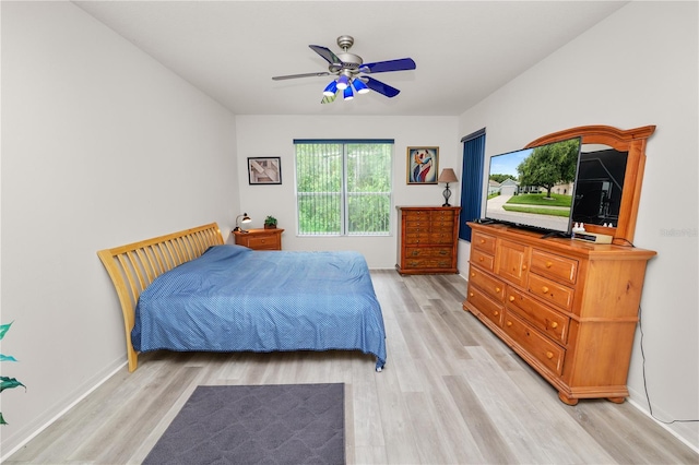 4242 Whistlewood Cir, Lakeland, FL 33811 - bedroom with light wood-type flooring and a ceiling fan