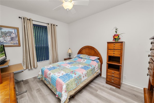 4242 Whistlewood Cir, Lakeland, FL 33811 - bedroom with wood finished floors and a ceiling fan