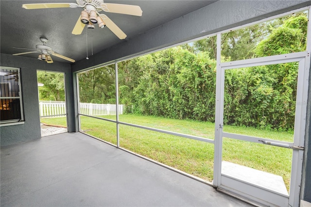 4242 Whistlewood Cir, Lakeland, FL 33811 - unfurnished sunroom with a ceiling fan