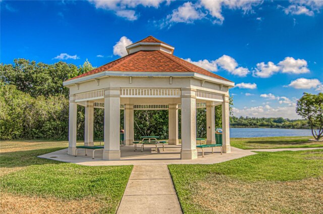 4242 Whistlewood Cir, Lakeland, FL 33811 - view of property's community featuring a gazebo, a lawn, and a water view