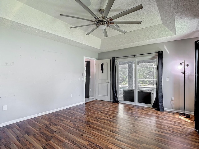173 Portland Ave, Spring Hill, FL 34606 - spare room with a textured ceiling, ceiling fan, and wood finished floors