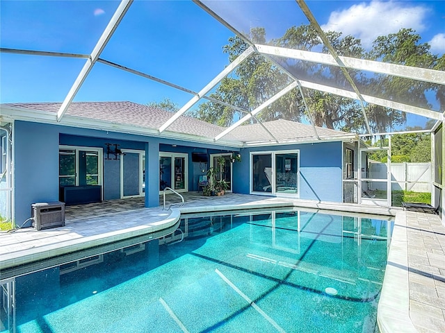 173 Portland Ave, Spring Hill, FL 34606 - view of swimming pool featuring a patio area, glass enclosure, and a ceiling fan
