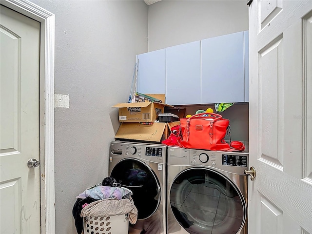173 Portland Ave, Spring Hill, FL 34606 - laundry area with washer and dryer and cabinet space