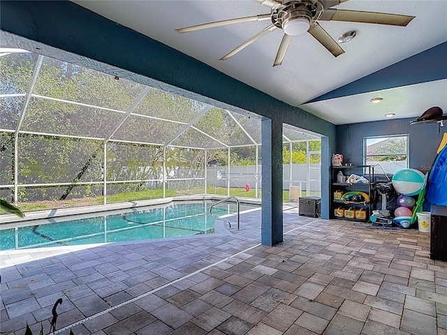 173 Portland Ave, Spring Hill, FL 34606 - view of swimming pool featuring a ceiling fan, a fenced backyard, a patio area, and glass enclosure