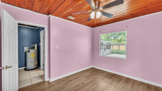 712 N Gary Rd, Lakeland, FL 33801 - empty room with electric water heater, wooden ceiling, a ceiling fan, light wood-type flooring, and crown molding
