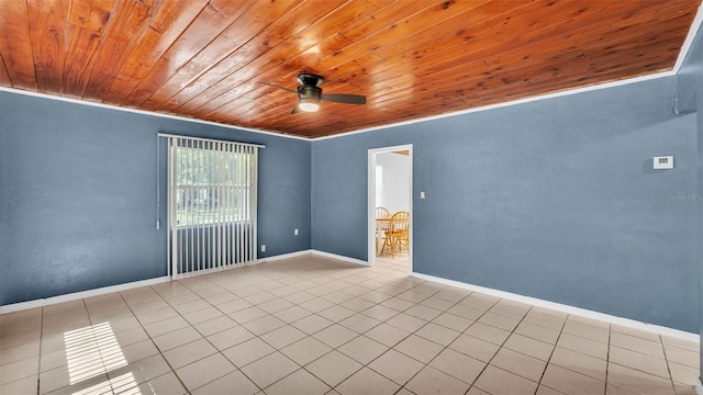712 N Gary Rd, Lakeland, FL 33801 - tiled spare room featuring wood ceiling, ceiling fan, and ornamental molding