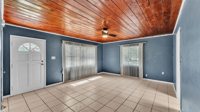 712 N Gary Rd, Lakeland, FL 33801 - tiled foyer entrance with wooden ceiling and a ceiling fan