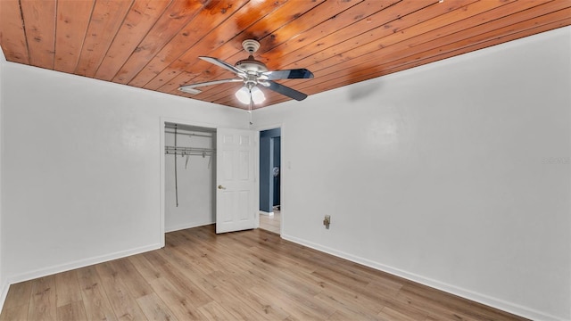 712 N Gary Rd, Lakeland, FL 33801 - unfurnished bedroom with wooden ceiling, light wood finished floors, a closet, and ceiling fan