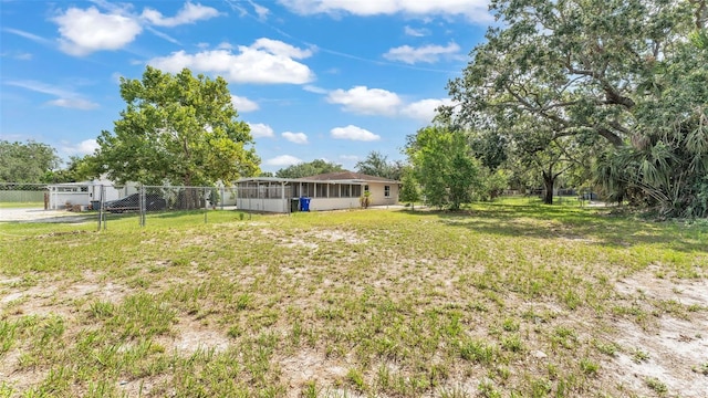712 N Gary Rd, Lakeland, FL 33801 - view of yard featuring a sunroom