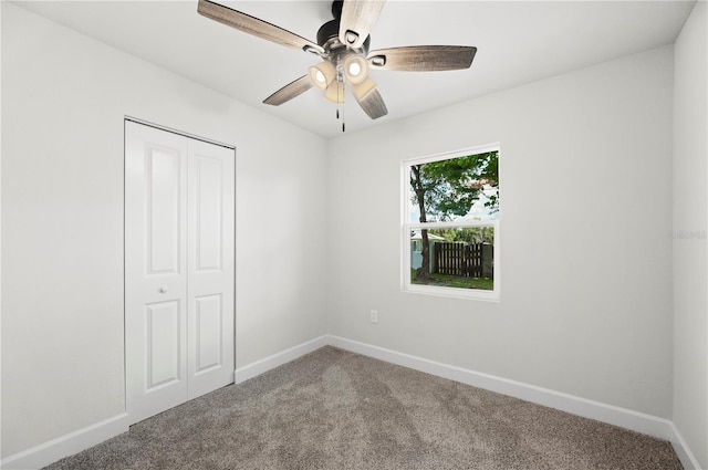 2633 Keysville Dr, Lithia, FL 33547 - unfurnished bedroom featuring carpet flooring, a closet, and ceiling fan