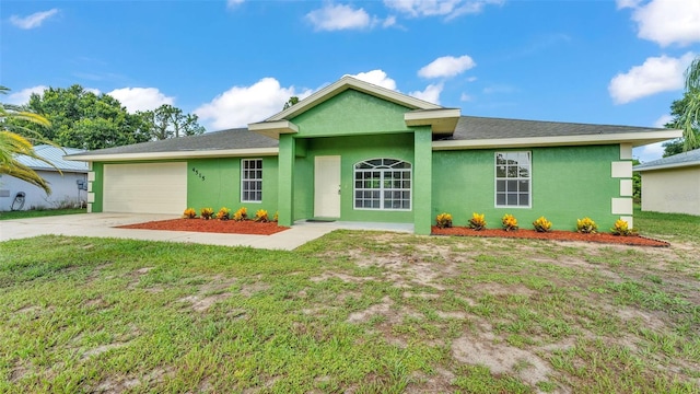 4515 Starfish Ave, Sebring, FL 33870 - single story home with a garage, driveway, stucco siding, and a front lawn