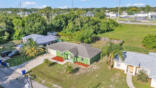 4515 Starfish Ave, Sebring, FL 33870 - view of subject property featuring a tree filled landscape