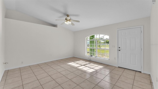 4515 Starfish Ave, Sebring, FL 33870 - foyer entrance with vaulted ceiling, ceiling fan, and light tile patterned floors