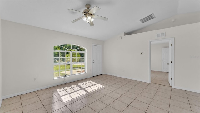4515 Starfish Ave, Sebring, FL 33870 - spare room featuring vaulted ceiling, a ceiling fan, and light tile patterned floors