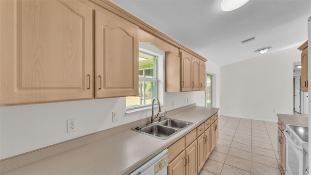 4515 Starfish Ave, Sebring, FL 33870 - kitchen featuring light brown cabinetry, white appliances, light countertops, and light tile patterned floors