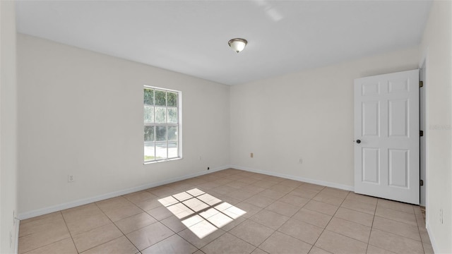 4515 Starfish Ave, Sebring, FL 33870 - spare room with light tile patterned flooring and baseboards