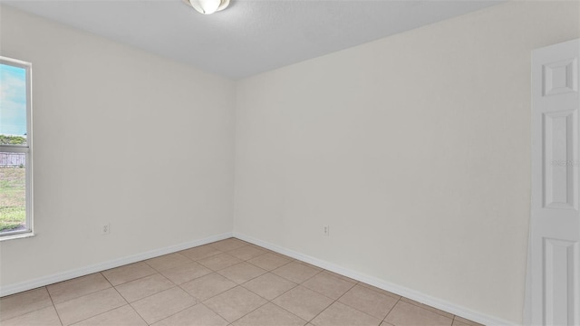 4515 Starfish Ave, Sebring, FL 33870 - unfurnished room featuring light tile patterned floors and baseboards