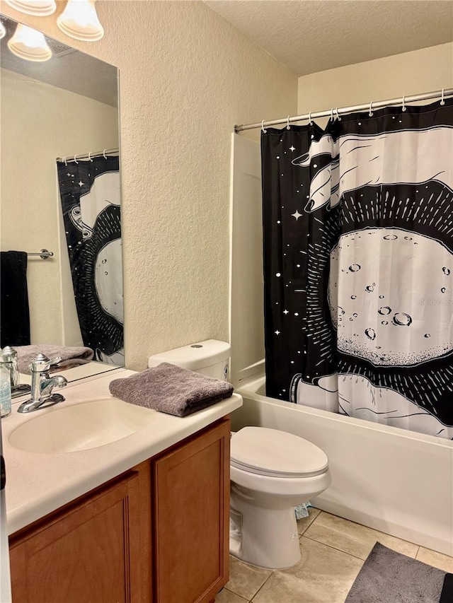 4665 SW 40th Pl, Ocala, FL 34474 - full bathroom featuring a textured wall, vanity, shower / bath combo with shower curtain, and a textured ceiling