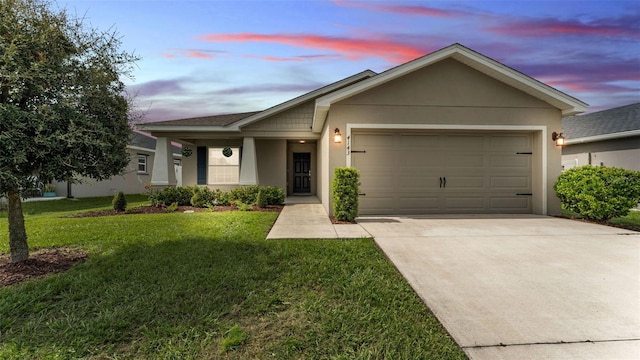 4143 Red Fern Ln, Lakeland, FL 33811 - single story home featuring an attached garage, stucco siding, driveway, and a front yard