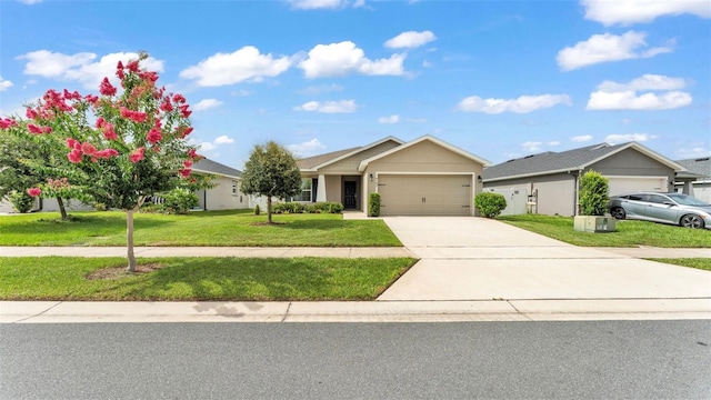 4143 Red Fern Ln, Lakeland, FL 33811 - ranch-style home with a garage, concrete driveway, and a front lawn