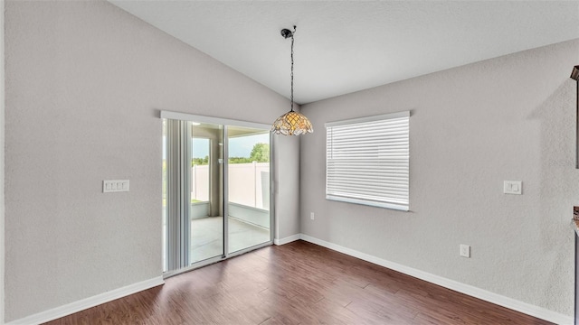 4143 Red Fern Ln, Lakeland, FL 33811 - spare room with wood finished floors and lofted ceiling