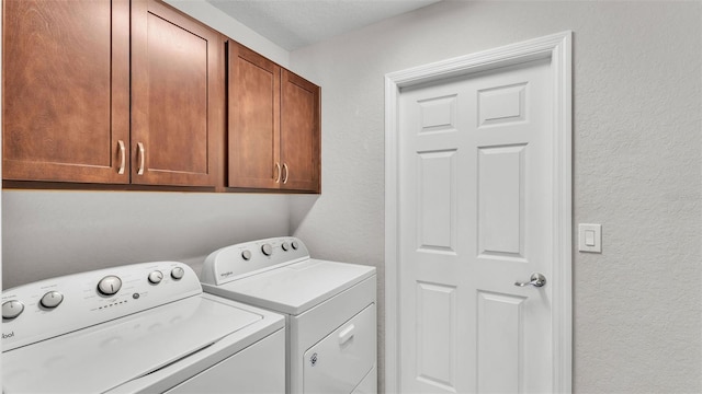 4143 Red Fern Ln, Lakeland, FL 33811 - laundry room with separate washer and dryer, cabinet space, and a textured wall