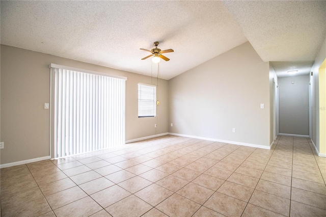 3582 Raintree Ct, Lakeland, FL 33803 - empty room featuring a ceiling fan, a textured ceiling, light tile patterned flooring, and vaulted ceiling