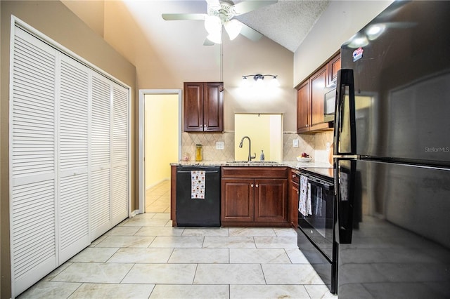 3582 Raintree Ct, Lakeland, FL 33803 - kitchen with black appliances, vaulted ceiling, backsplash, ceiling fan, and light stone countertops