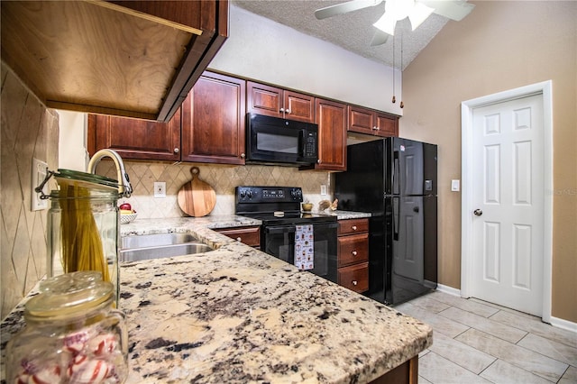 3582 Raintree Ct, Lakeland, FL 33803 - kitchen with black appliances, tasteful backsplash, vaulted ceiling, a ceiling fan, and light stone countertops